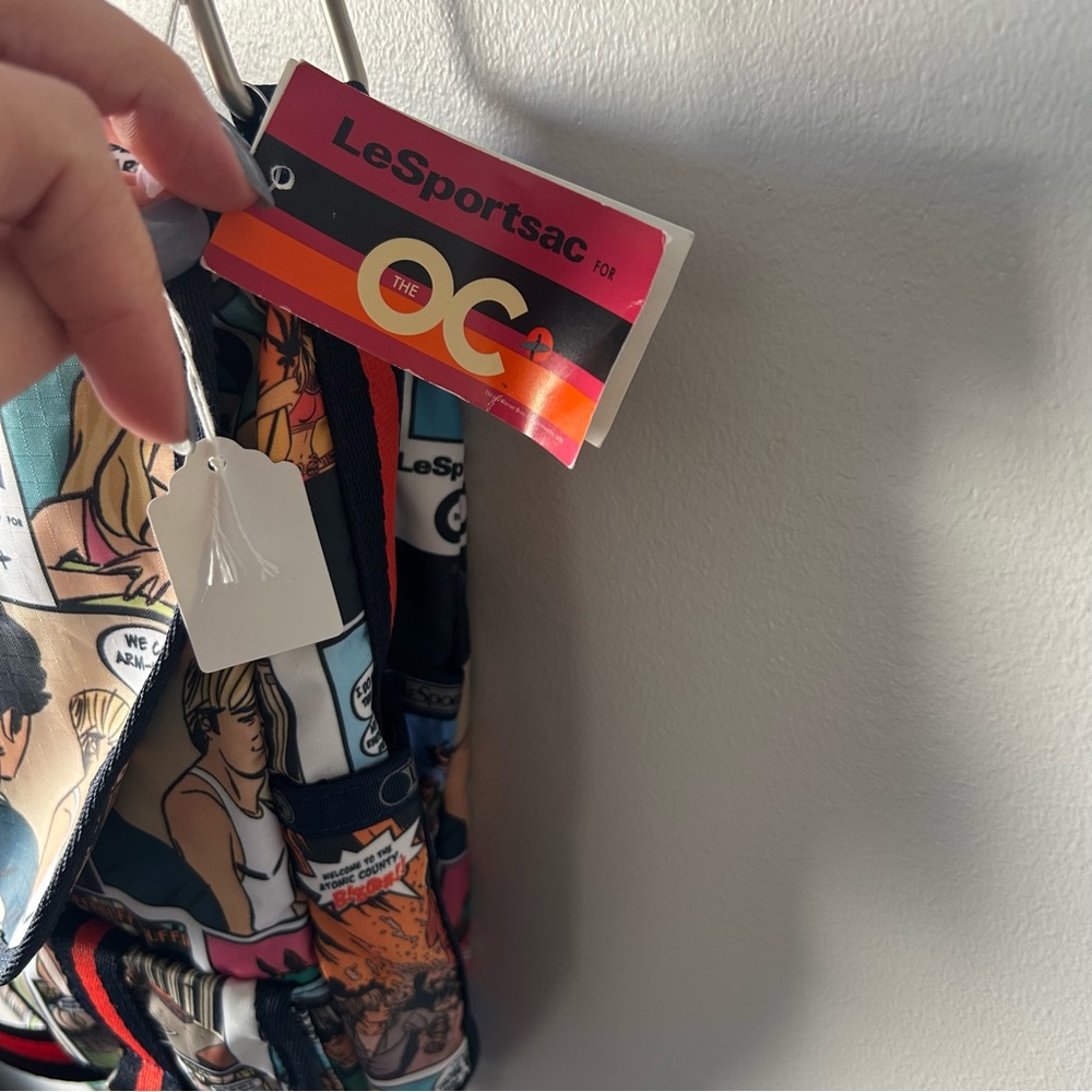 LeSport Sac comic book print messenger bag RARE discontinued The O.C nwt - Picture 3 of 8